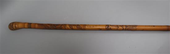 A Japanese carved bamboo walking cane length 89cm